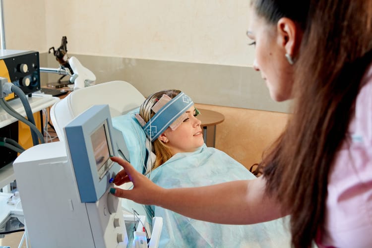 Woman undergoing brainwave exam